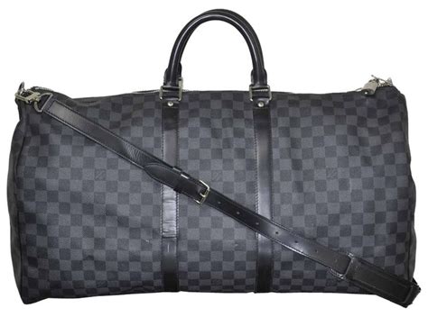 lv duffle bag black and grey|black louis vuitton duffle bag.